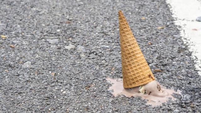 ice-cream-ground-selective-focus-chocolate-icecream-cone-dropped-concrete-floor-melt-83708802